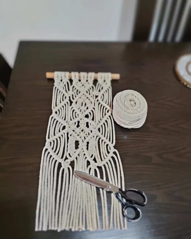 Artisans sewing premium bags with leather and Ankara